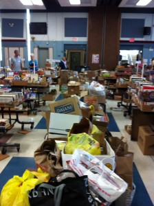 The line of book donations still to be sorted as of school closing time after our first week at the school.